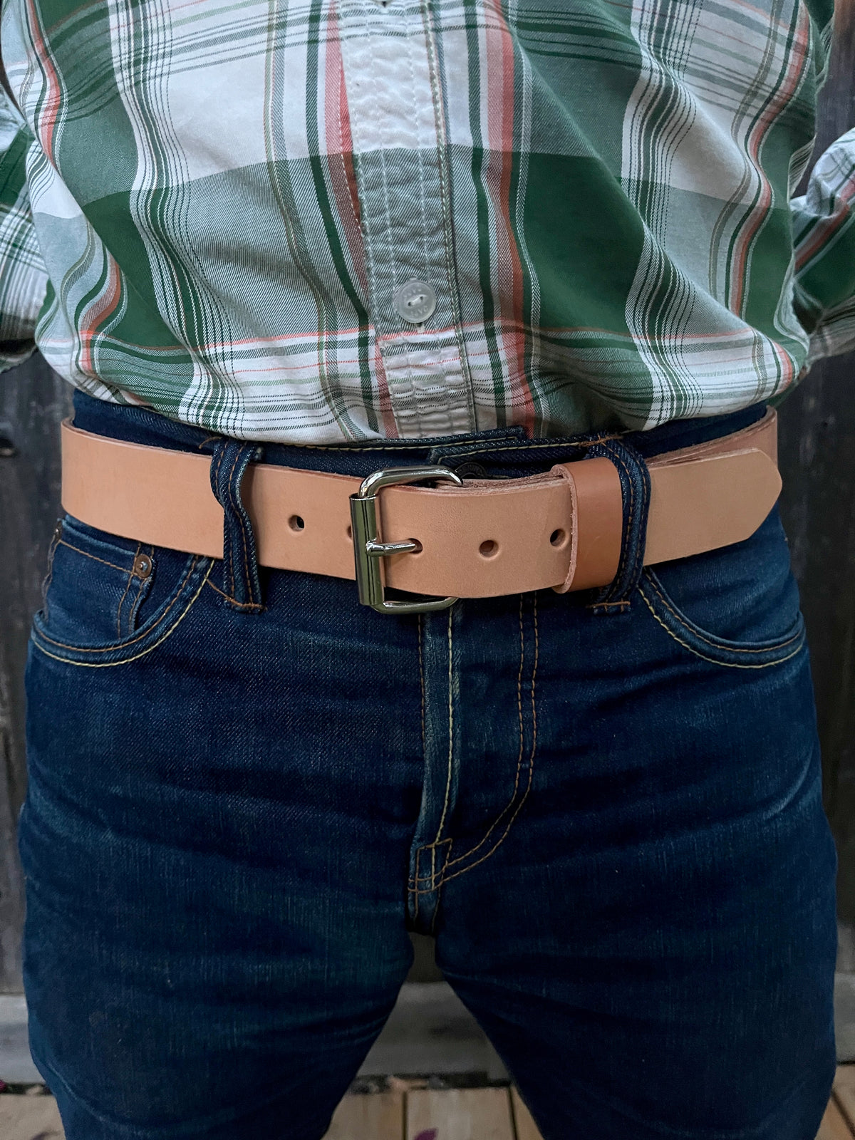 man wearing a veg tan natural belt