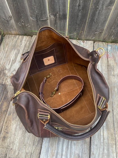 Brown leather bag opened